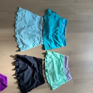 4 Girl’s Ivivva ruffle skirts. Size 12